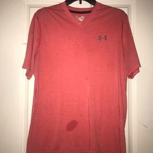 Under Armour peach colored athletic shirt